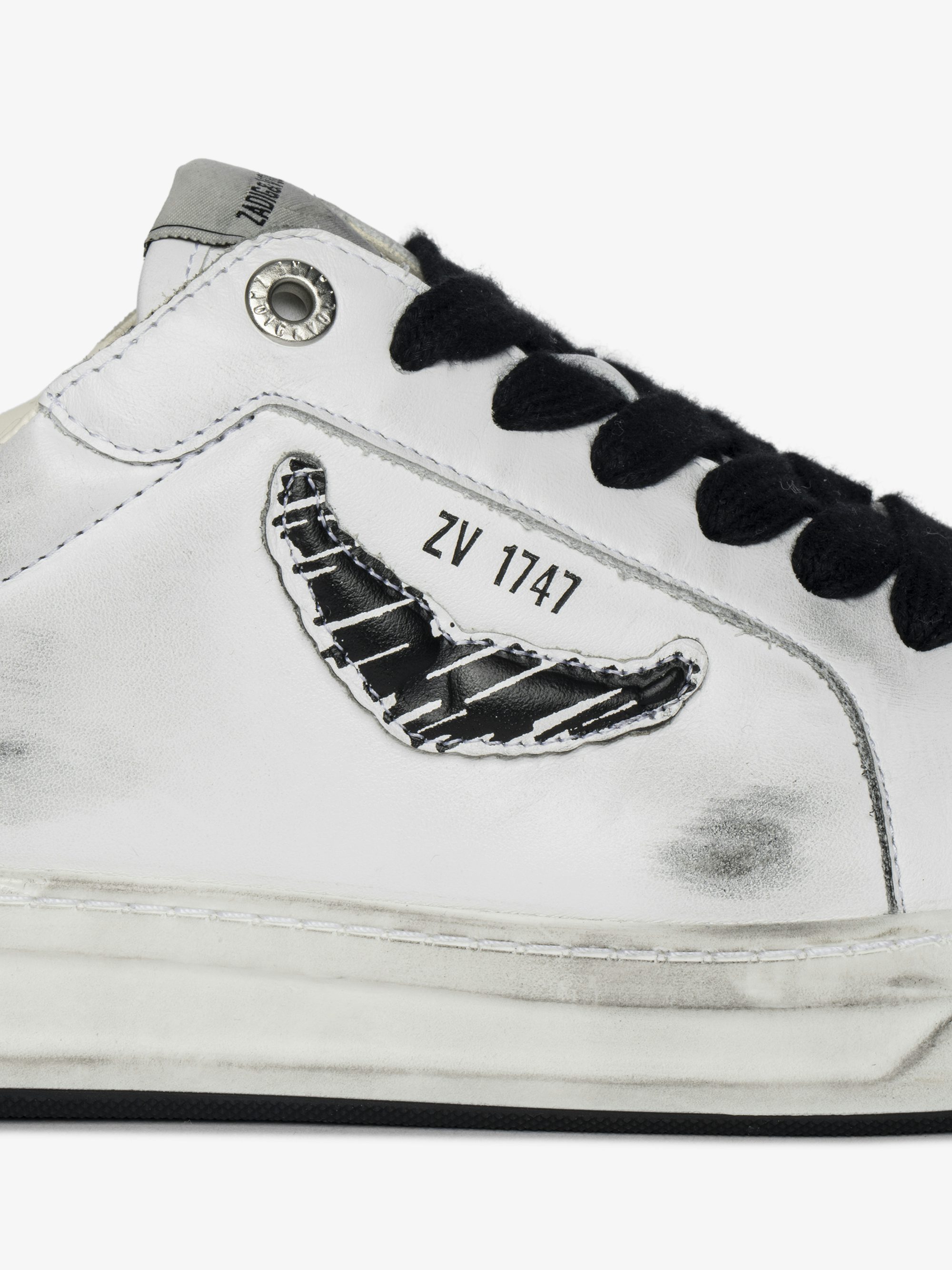 Basses Fly Wings Sneakers - Low-top sneakers in worn-effect leather with embossed wings.